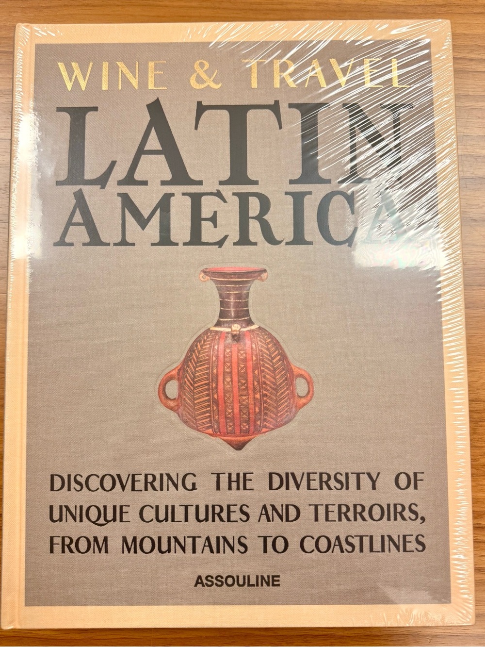 Assouline Beige Cover with Brown & Gold Lettering